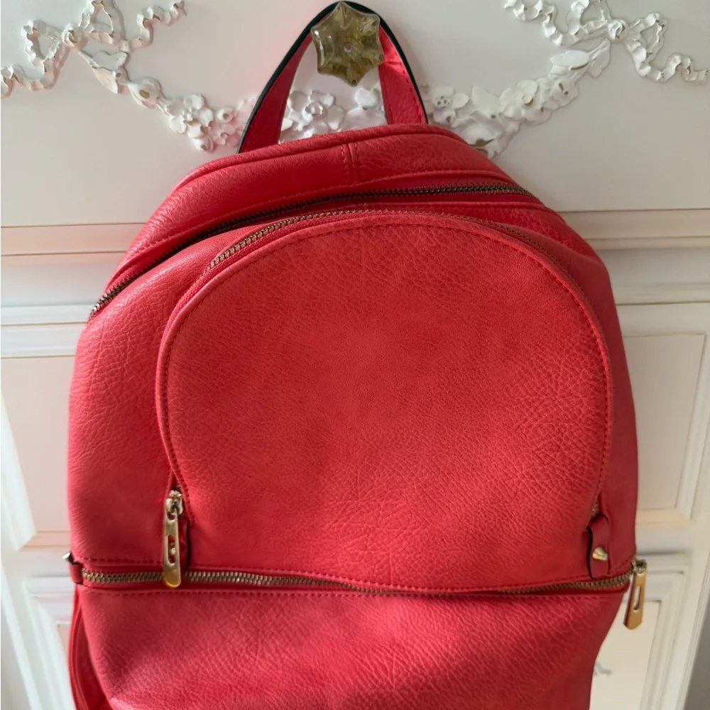 Salmon colored Real Italian leather mini backpack with gold hardware